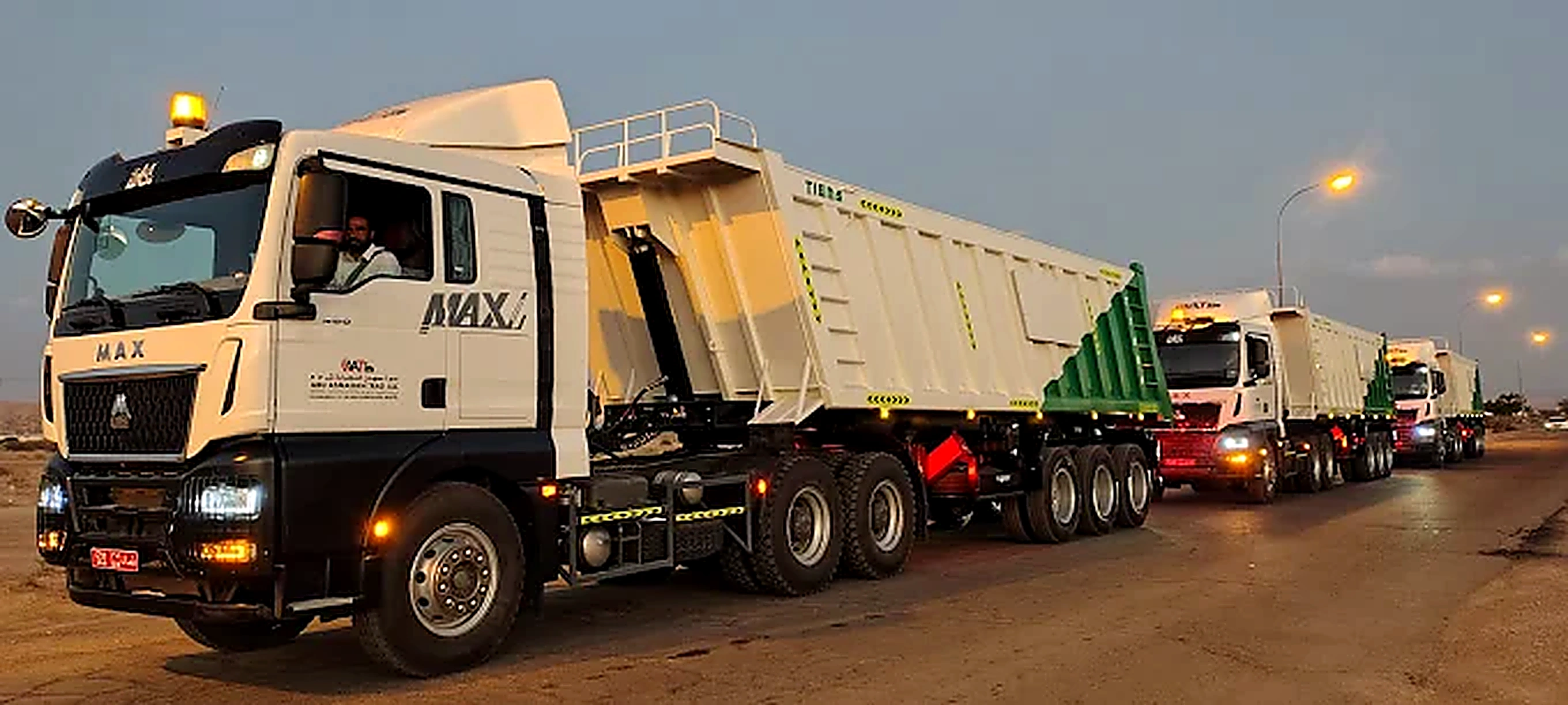 Abu Asmahan Trading fleet convoy on the road in Oman