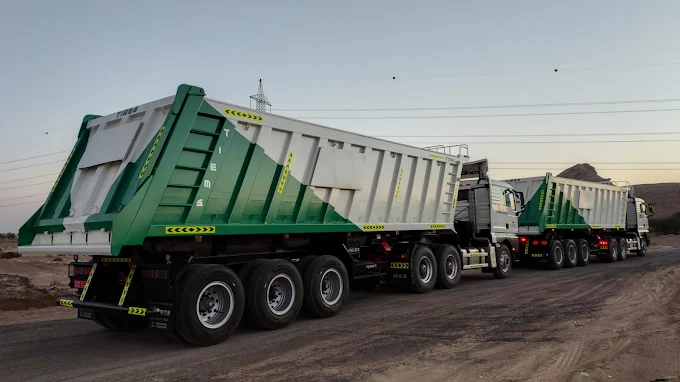 Heavy trailer convoy operating at dusk